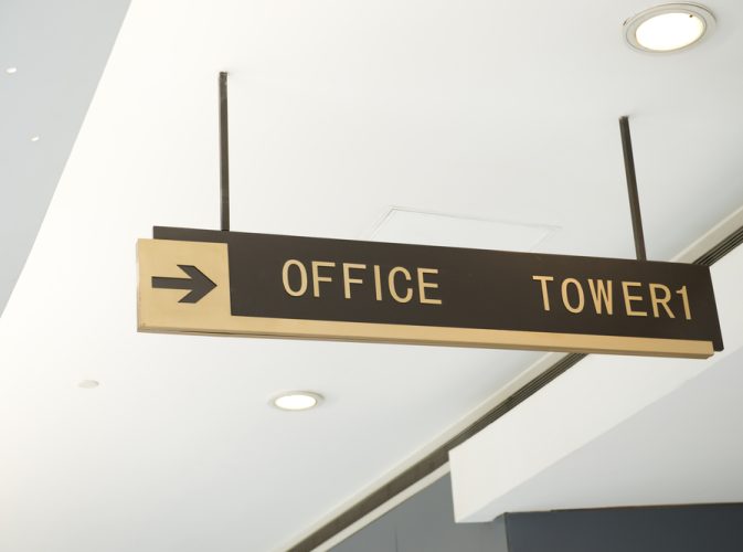 Office,Sign,Suspended,From,The,Ceiling,Of,Corridor.